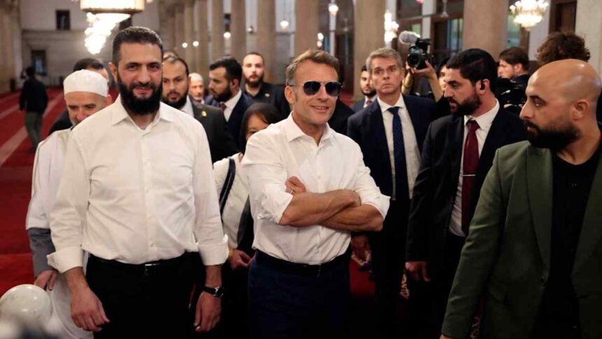 Explosions shake Damascus as Macron visits